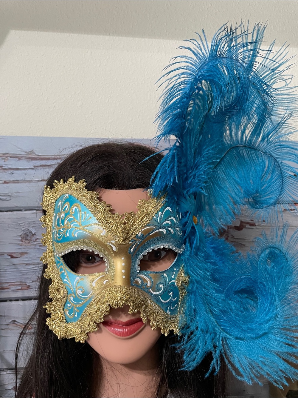 Blue and Gold Venetian Masquerade Mask with Feathers. Italy